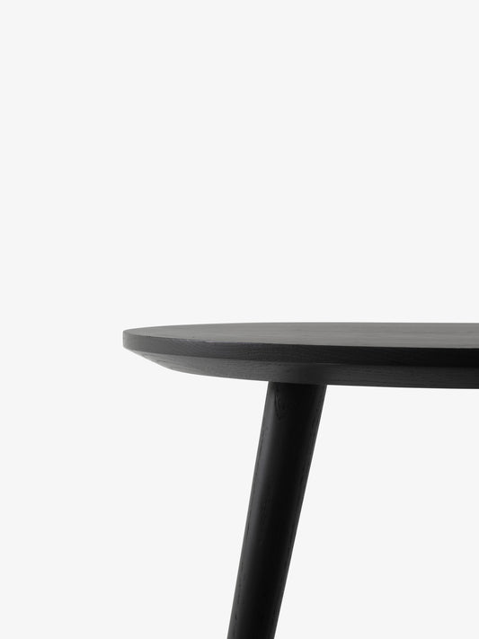 In between SK3 table stained black oak ø90cm
